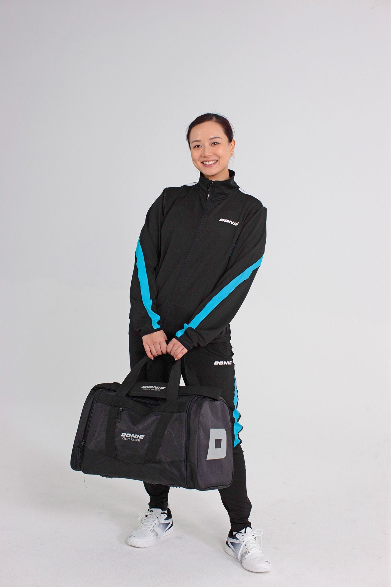 Donic Trainingsjack Averis zwart/lichtblauw/wit